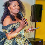 Isatu Kamara giving a speech